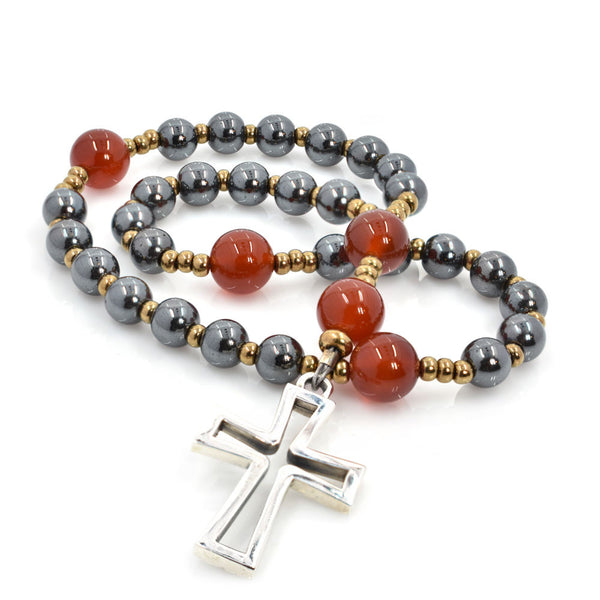 33-Bead Prayer Beads made with gunmetal hematite and red carnelian stones, finished with a satin-finish white bronze Latin cross.